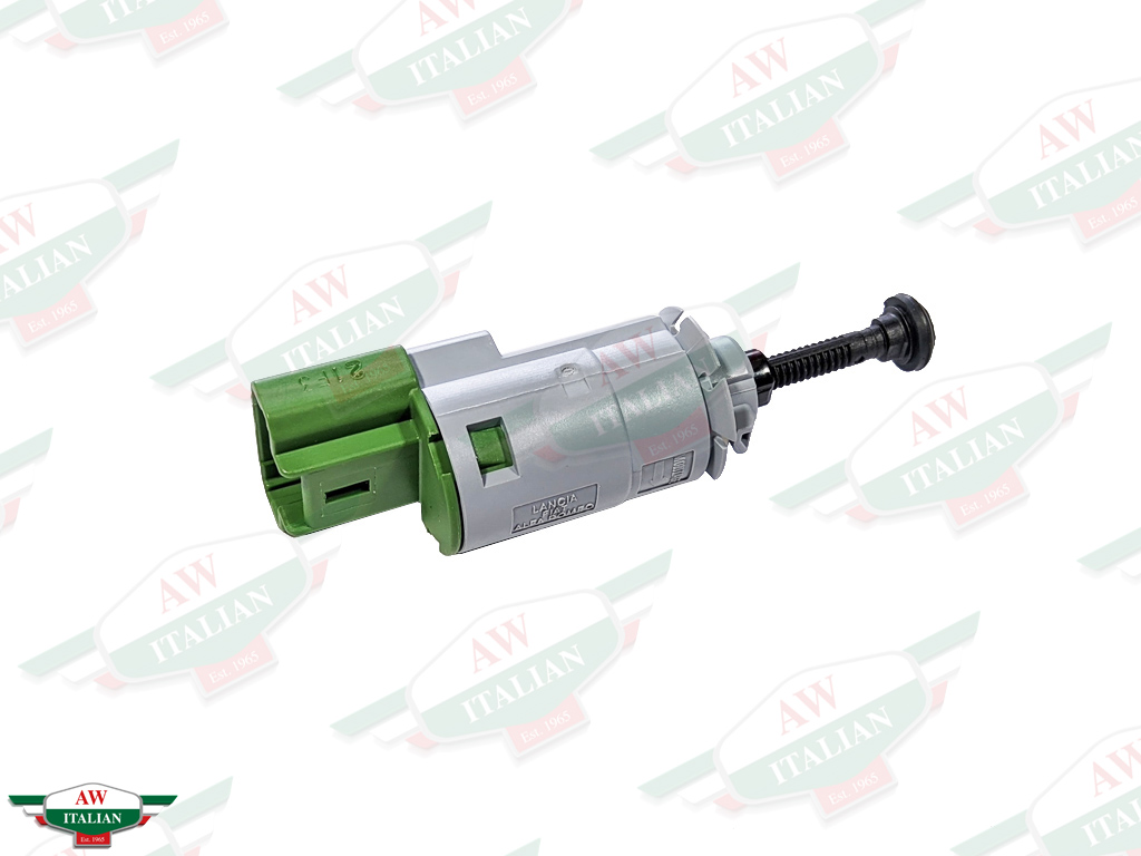 grey cylinder with green end and black peg