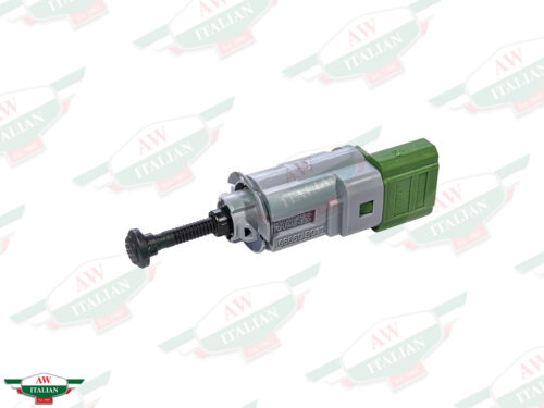 grey cylinder with green end and black peg