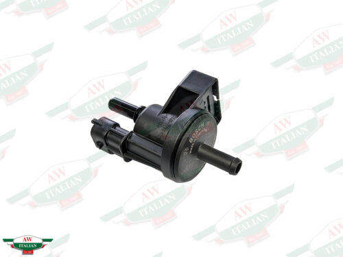 black plastic valve with nipples on each end