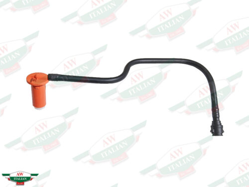 orange plastic cylinder with black hose attached