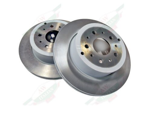 two grey metal discs on white background