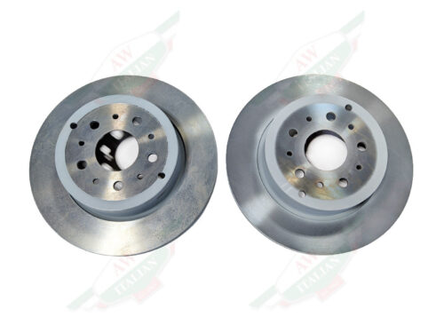 two grey metal discs on white background