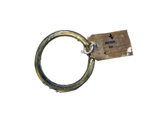 grey circle with paper tag attached