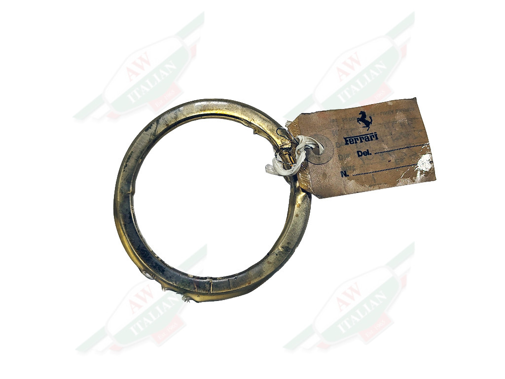 grey circle with paper tag attached