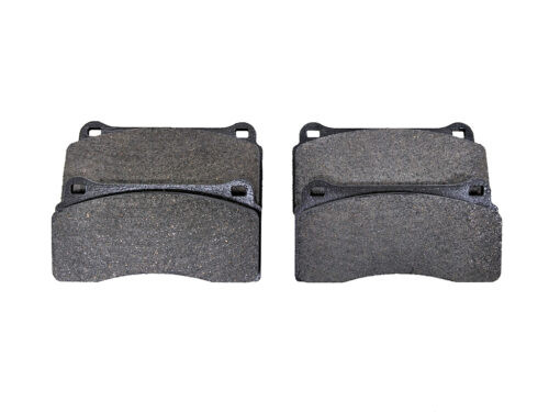 4 brake pads on white background