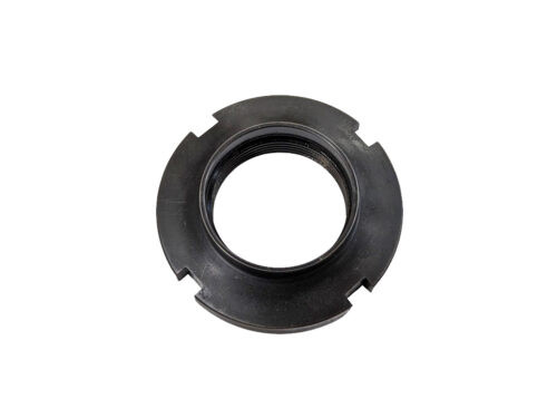 black round nut with 4 notches on outer edge