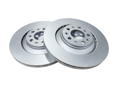 grey metal discs with holes in center