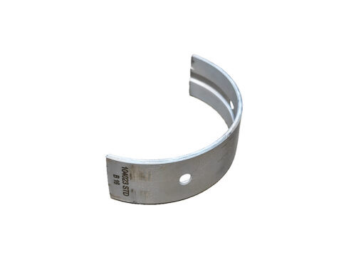 curved metal engine bearing
